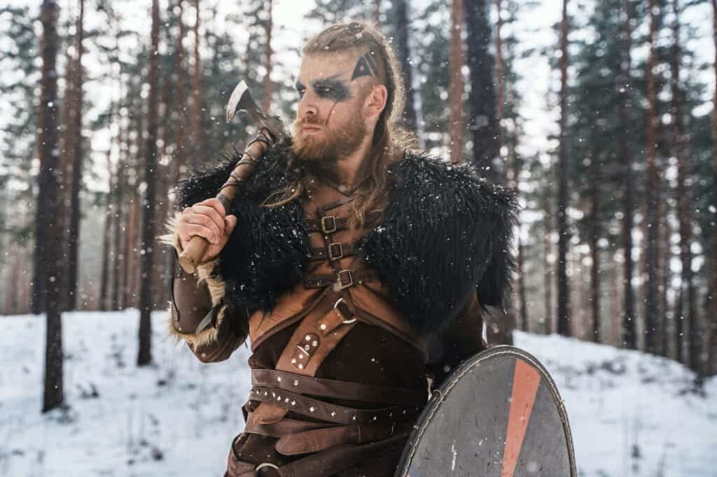 Norse Warrior Poised with Axe and Shield. Knows how viking mead was made