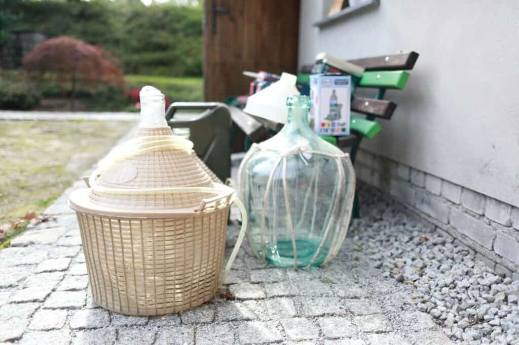 Closeup of empty containers for wine in a backyard